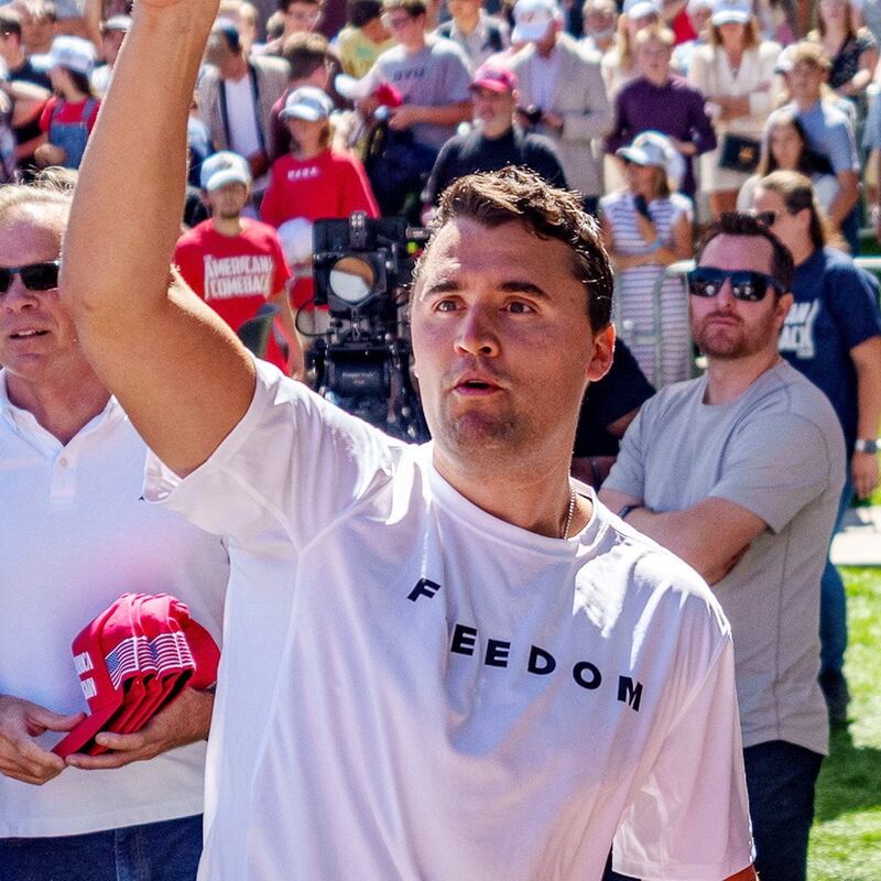 Right-wing activist and commentator Charlie Kirk throws hats to the crowd shortly before he was shot at a Utah Valley University speaking event in Orem, Utah, Sept. 10, 2025.