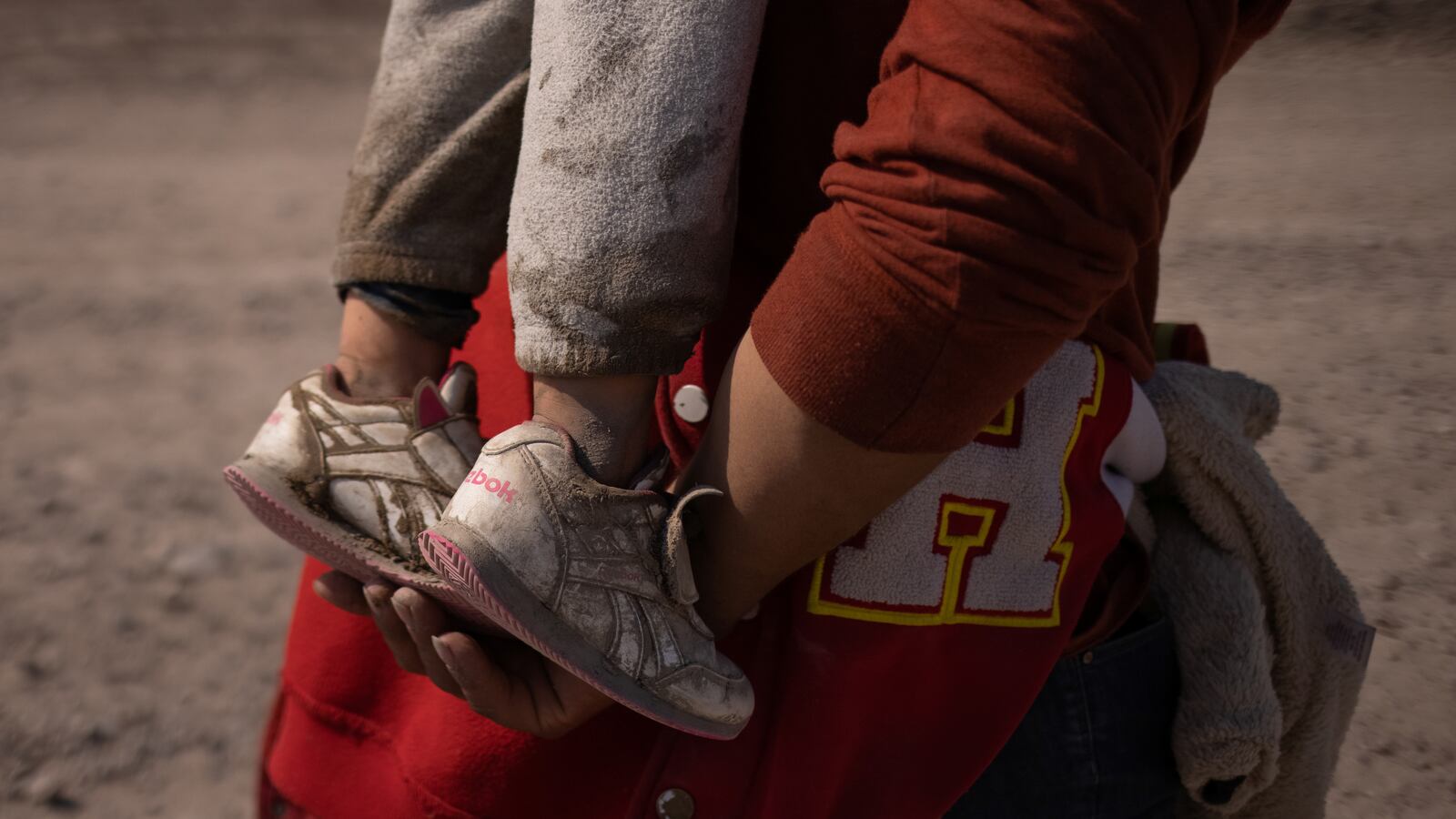 2021-03-27T113103Z_711539313_RC2NJM9UHZQZ_RTRMADP_3_USA-IMMIGRATION-CHILDREN_tsjjbc