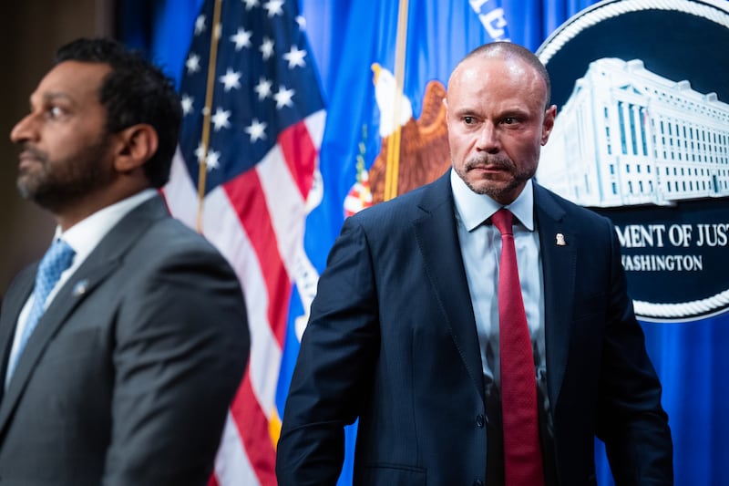 FBI Director Kash Patel, left, and Dan Bongino, deputy director of the FBI, conduct a news conference at the Department of Justice on Thursday, December 4, 2025,