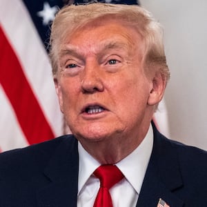 PALM BEACH, FLORIDA - NOVEMBER 27: President Donald Trump participates in a call with U.S. service members from his Mar-a-Lago club in Florida on Thanksgiving Day on November 27, 2025 in Palm Beach, Florida. (Photo by Pete Marovich/Getty Images)