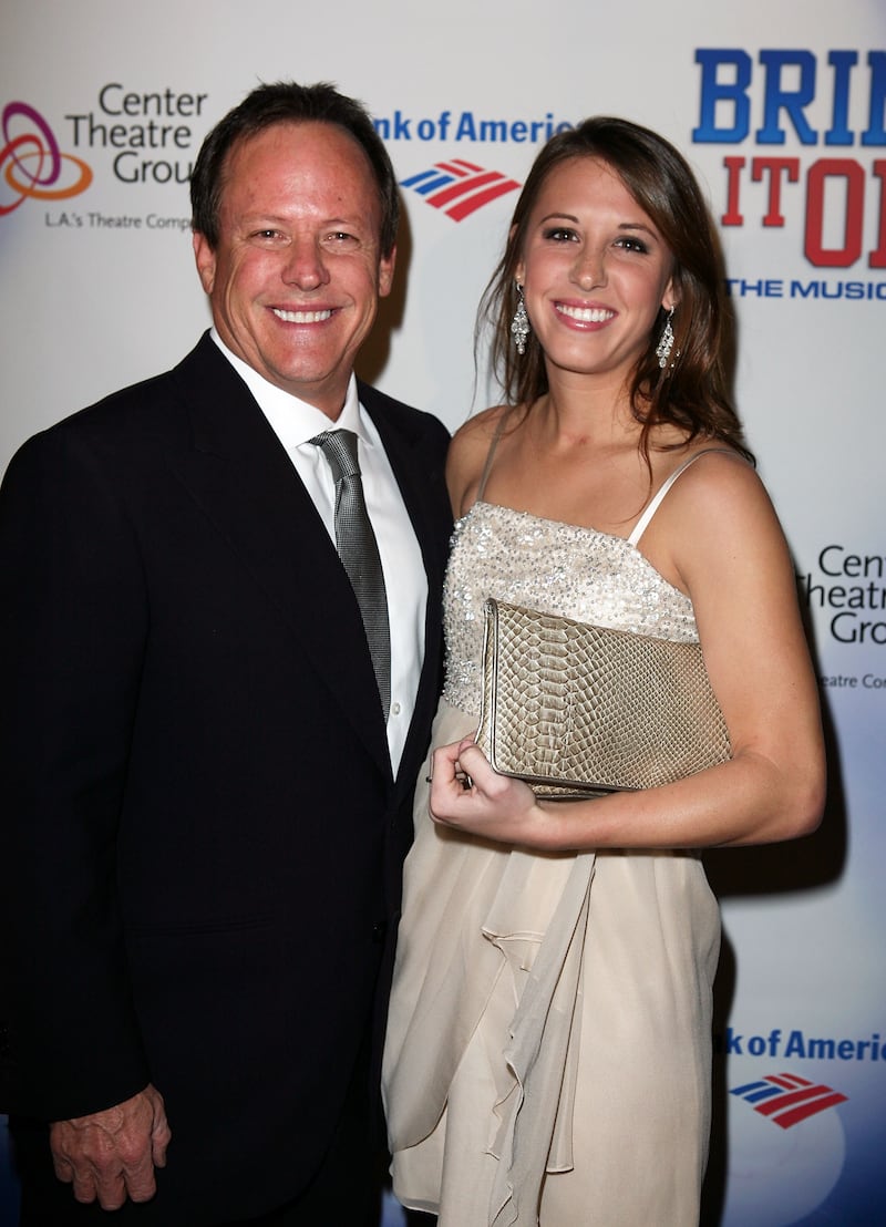 Jeff Webb, President and CEO Varsity Brands, walks the red carpet with his daughter Caroline Webb.