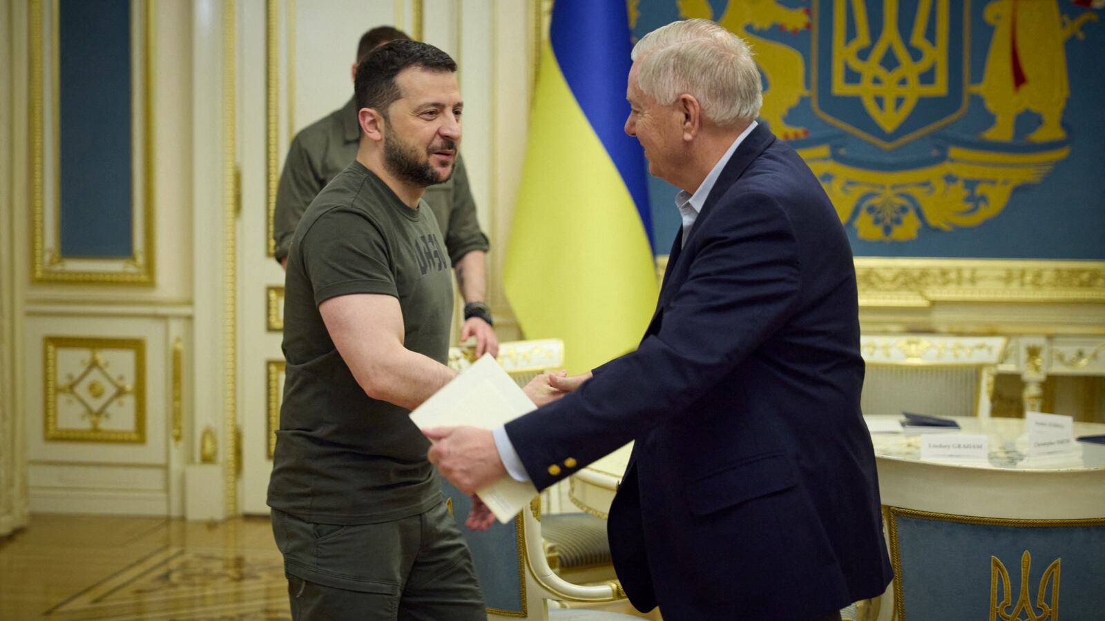 Volodymyr Zelensky and Lindsey Graham.