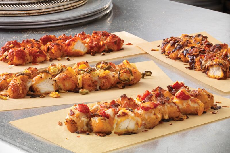 articles/2014/04/16/domino-s-fried-chicken-crust-pizza-means-we-ve-hit-peak-food-trolling/140416-dominos-gross-tease_khxavo