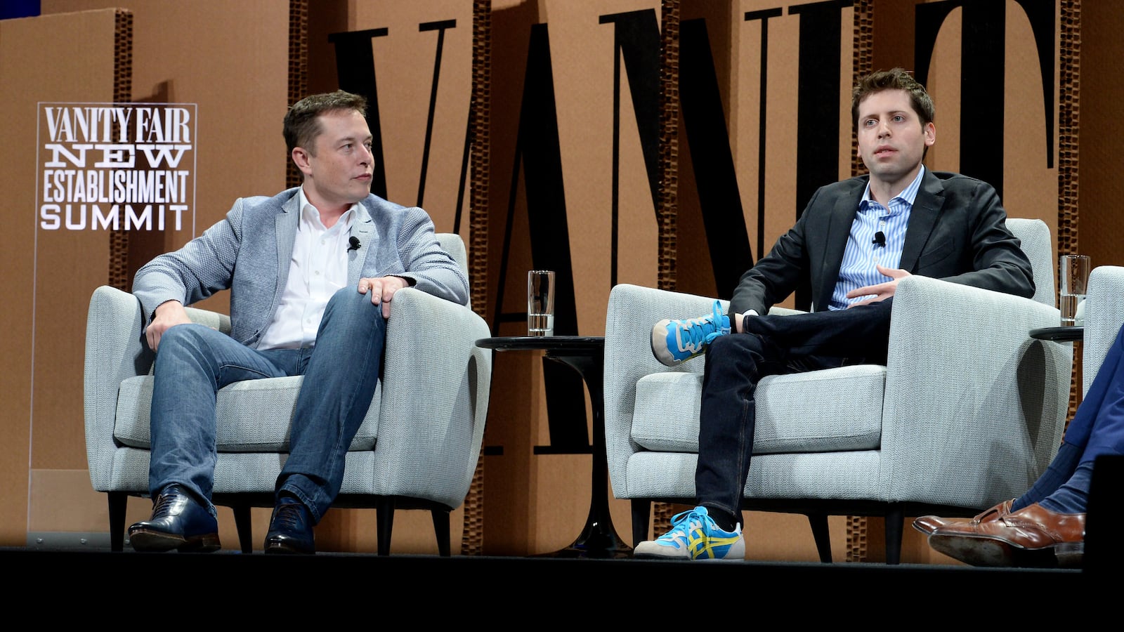 Elon Musk and Sam Altman speak together at a panel forum in San Francisco in 2015.
