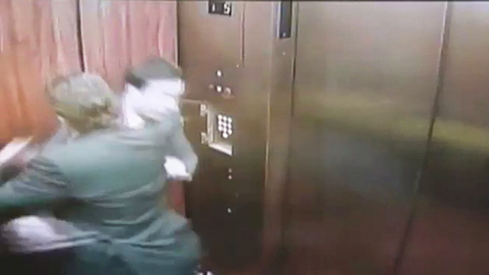 videos/2010/06/12/bradley-cooper-jimmy-fallon-elevator-wrestle/fallon-cooper_ng9nyn