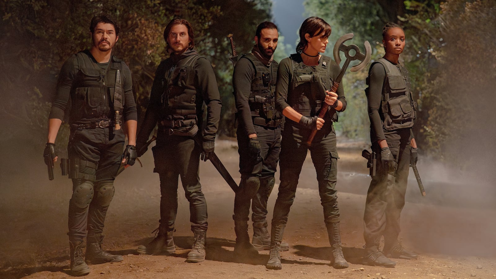 Henry Golding as Tuah, Luca Marinelli as Nicky, Marwan Kenzari as Joe, Charlize Theron as Andy and KiKi Layne as Nile