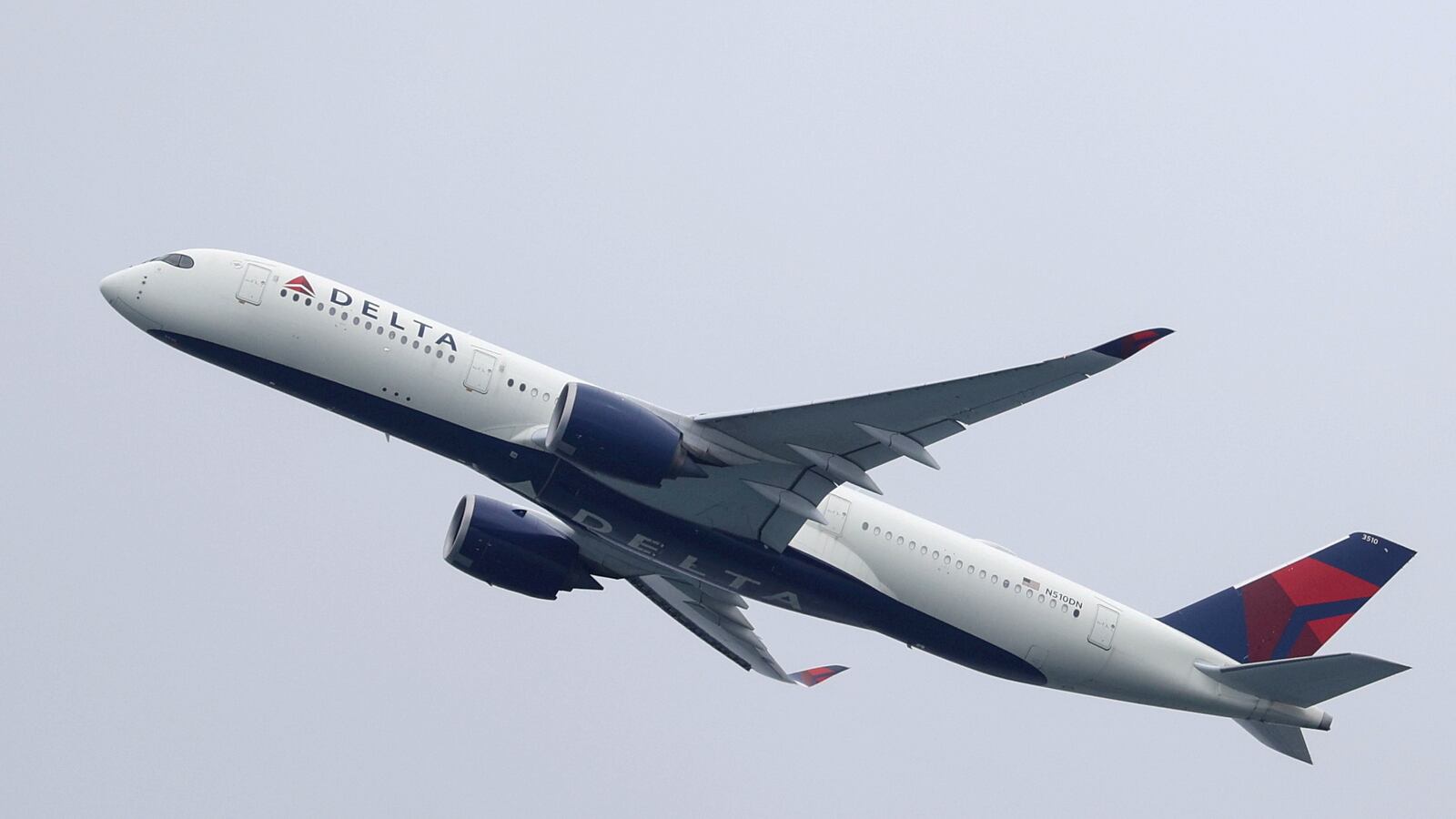 A Delta Air Lines plane ascends after taking off from Sydney, Australia.