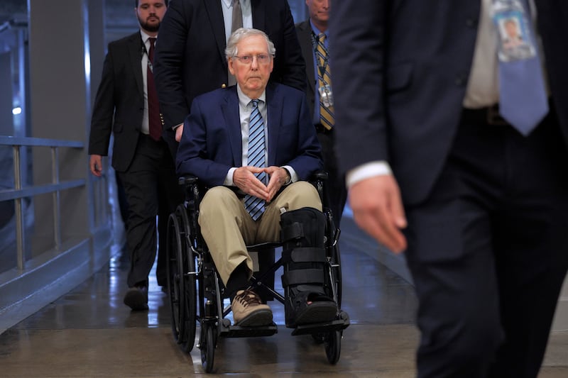 WASHINGTON, DC - FEBRUARY 18:  U.S. Sen. Mitch McConnell (R-KY) is pushed in a wheelchair as he heads for votes at the Capitol on February 18, 2025 in Washington, DC. President Donald Trump said Tuesday that Ukraine "should have never started it" in comments about Russia's invasion of the country in February 2022. (Photo by Chip Somodevilla/Getty Images)