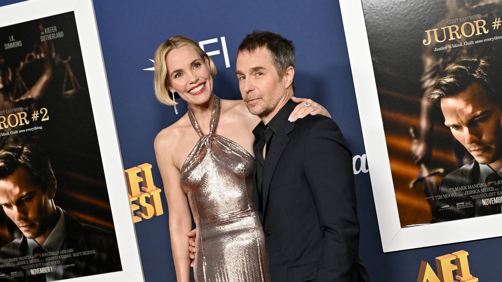 HOLLYWOOD, CALIFORNIA - OCTOBER 27: Leslie Bibb and Sam Rockwell attend the 2024 AFI Fest - Closing Night Gala Premiere of "Juror #2" at TCL Chinese Theatre on October 27, 2024 in Hollywood, California. (Photo by Axelle/Bauer-Griffin/FilmMagic)
