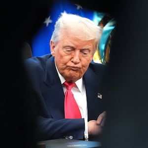 U.S. President Donald Trump answers questions from reporters