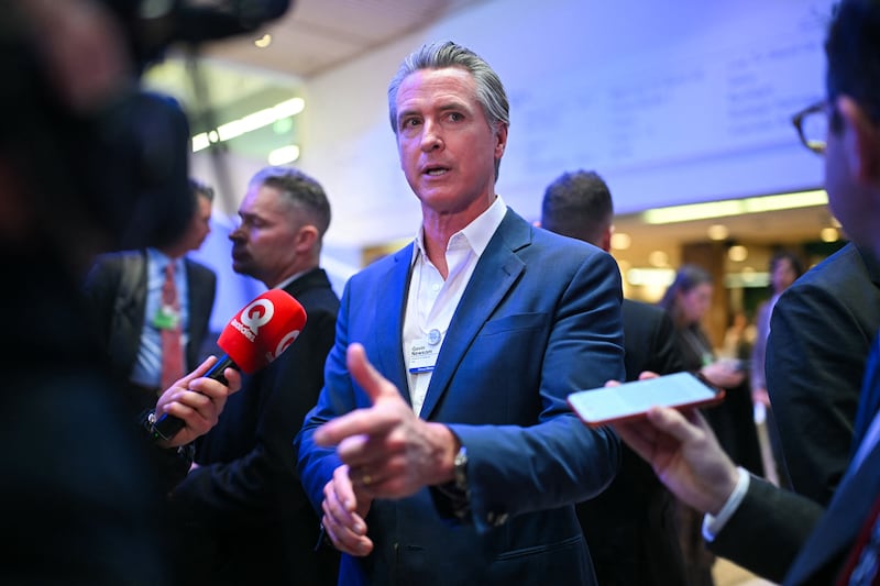 Gavin Newsom speaks to the press on the sidelines of the World Economic Forum (WEF) annual meeting in Davos on January 20, 2026.