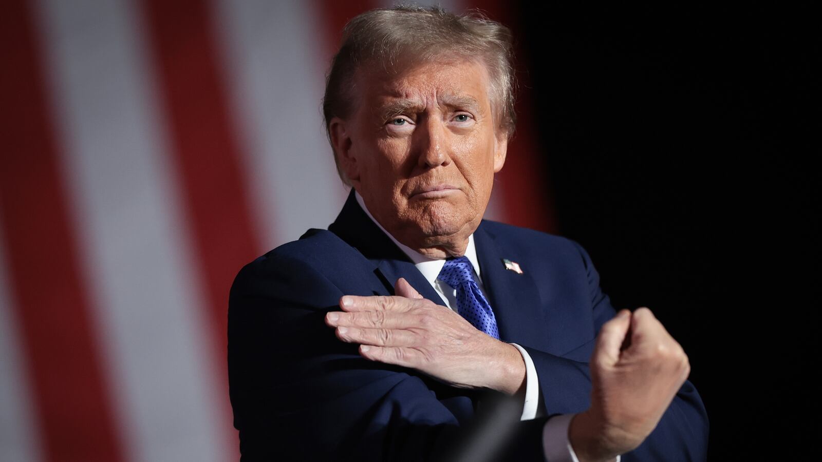 LATROBE, PENNSYLVANIA - OCTOBER 19: Republican presidential nominee, former U.S. President Donald Trump, gestures to the crowd as he concludes a campaign rally on October 19, 2024, in Latrobe, Pennsylvania.