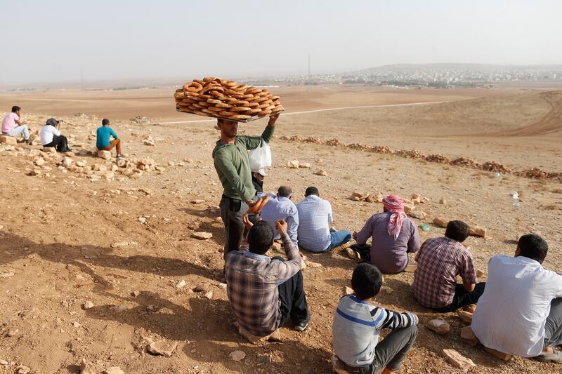 galleries/2014/10/08/unrest-in-kobani/141013-kobani-attack1_p5acwo
