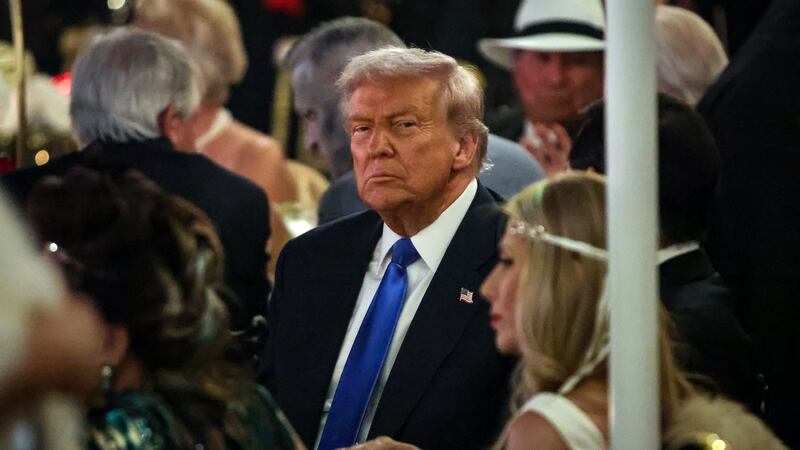 PALM BEACH, FLORIDA - OCTOBER 31: US President Donald Trump talks with guests during a Halloween party at his Mar-a-Lago estate on October 31, 2025 at Palm Beach, Florida. Trump is spending the weekend at his Mar-A-Lago estate in Palm Beach, Florida. (Photo by Samuel Corum/Getty Images)