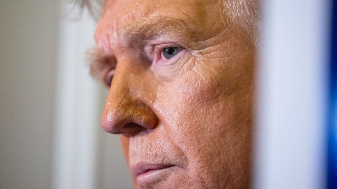 US President Donald Trump speaks to journalists aboard Aire Force One as he travels from West Palm Beach back to Washington on March 9, 2025. (Photo by ROBERTO SCHMIDT / AFP) (Photo by ROBERTO SCHMIDT/AFP via Getty Images)