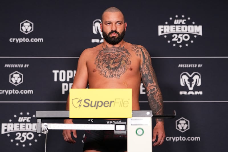 Josh Hokit on the scale during the UFC Freedom 250 Official Weigh-in.