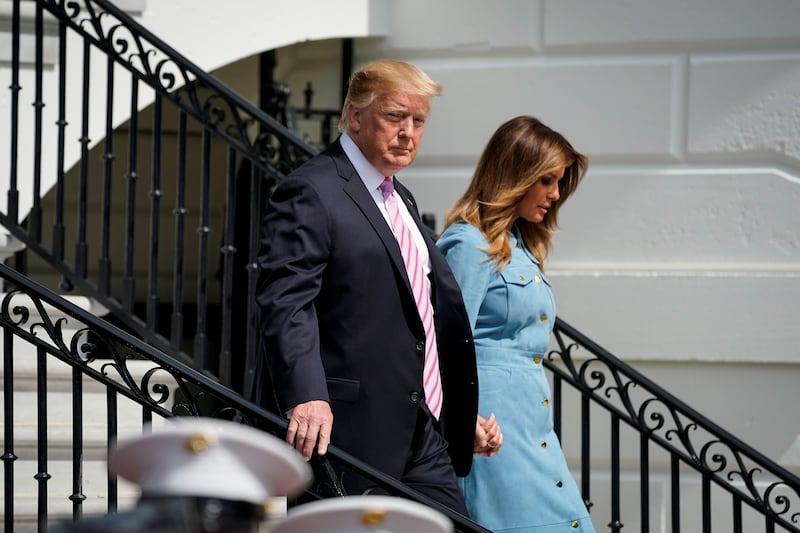 U.S. President Donald Trump and first lady Melania Trump made it down the stairs without any issues.