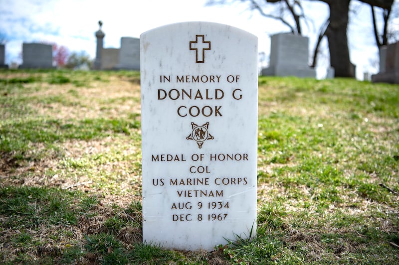 Memorial marker of U.S. Marine Corps Col. Donald Cook, Medal of Honor recipient, in Memorial Section I of Arlington National Cemetery, Arlington, Virginia, March 17, 2020.