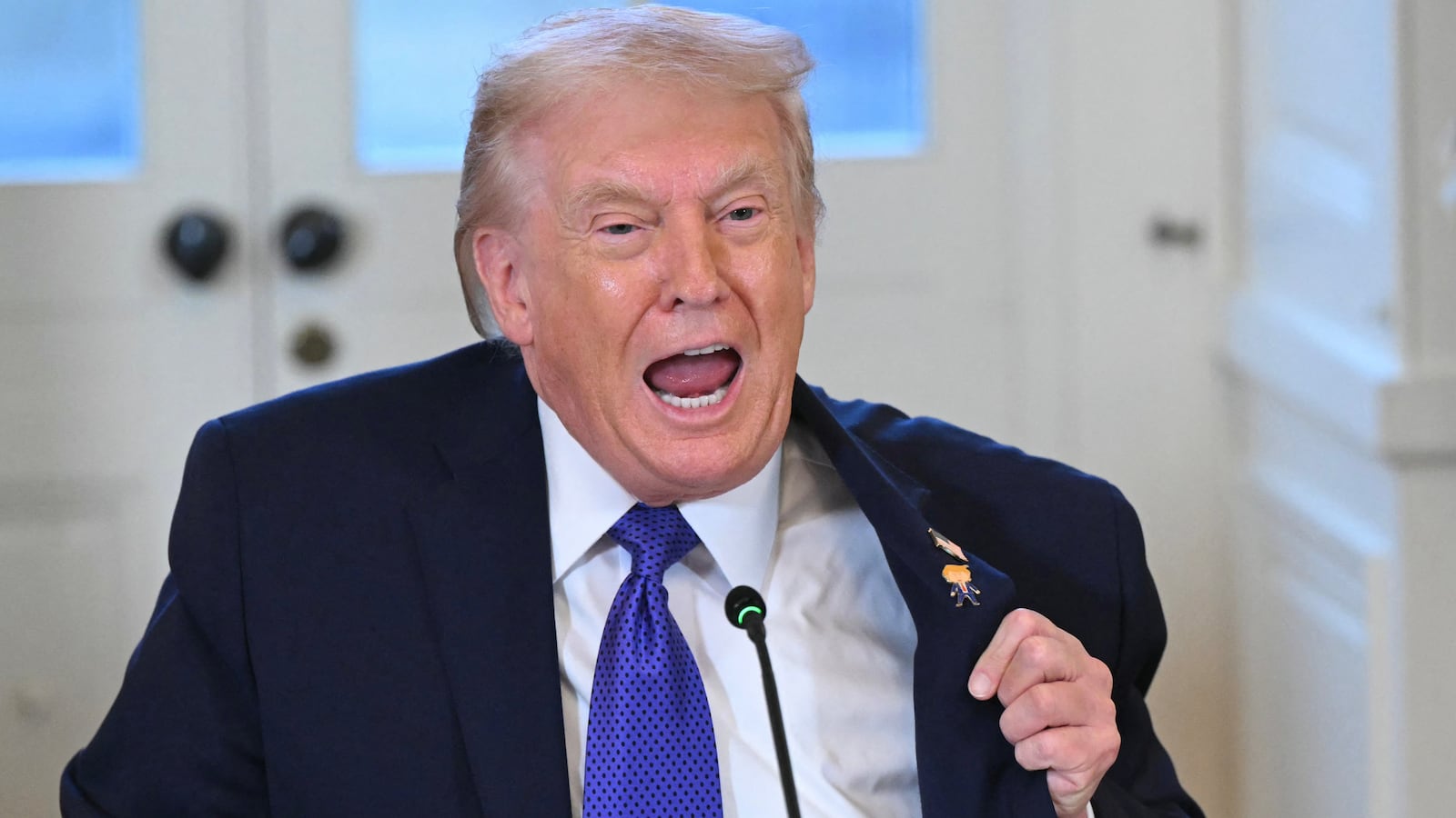 Donald Trump speaks during a meeting with US oil companies executives in the East Room of the White House in Washington, DC on January 9, 2026.