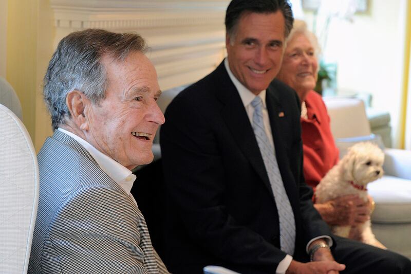 articles/2012/03/30/romney-endorsement-poll-results/romney-wooed-bush-clan-mckinnon-tease_h2nftb