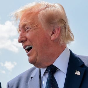 U.S. President Donald Trump is greeted by Turkish President Tayyip Erdogan after arriving aboard Air Force One at Etimesgut Air Base to take part in a NATO summit, in Ankara, Turkey, July 7, 2026.