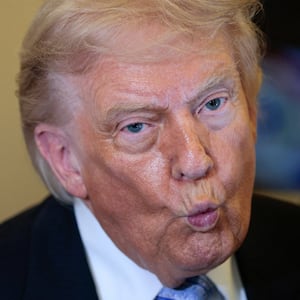 U.S. President Donald Trump speaks to the press aboard Air Force One enroute to the U.S.  following his official visit with President Xi Jinping in China, May 15, 2026. REUTERS/Evan Vucci