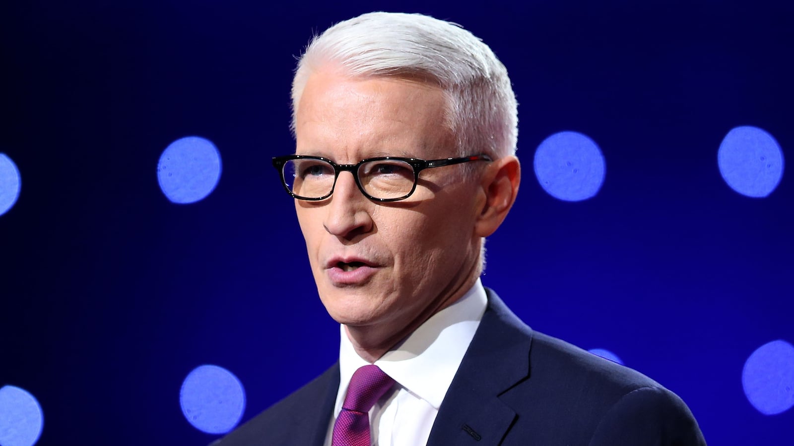 FLINT, MI - MARCH 06: Debate moderator Anderson Cooper looks during the CNN Democratic Presidential Primary Debate between Democratic presidential candidate Hillary Clinton and candidate Senator Bernie Sanders (D-VT) at the Whiting Auditorium at the Cultural Center Campus on March 6, 2016 in Flint, Michigan. Voters in Michigan will go to the polls March 8 for the state's primary. (Photo by Scott Olson/Getty Images)