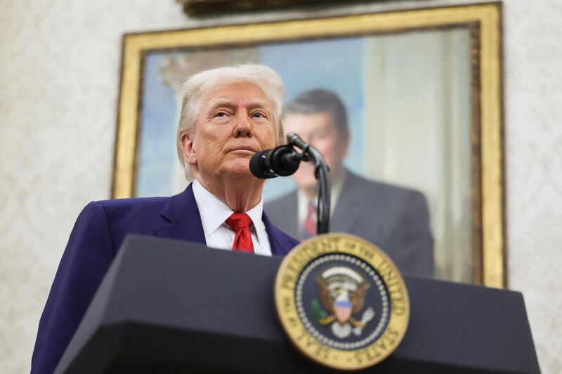 U.S. President Donald Trump looks on as he takes questions from the press during a swearing-in ceremony for the interim U.S. Attorney for the District of Columbia, Jeanine Pirro, at the White House in Washington, D.C., U.S., May 28, 2025. REUTERS/Leah Millis