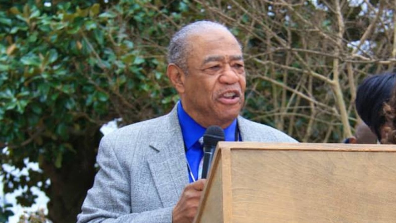 John Rogers speaks on stage at an event in 2014.