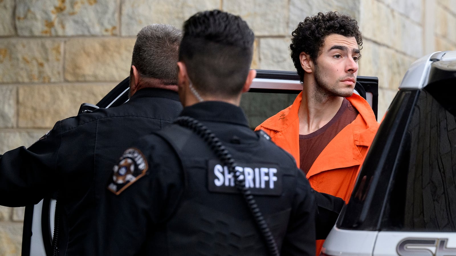 Luigi Mangione is led into the Blair County Courthouse for an extradition hearing Dec. 10, 2024 in Hollidaysburg, Pennsylvania.