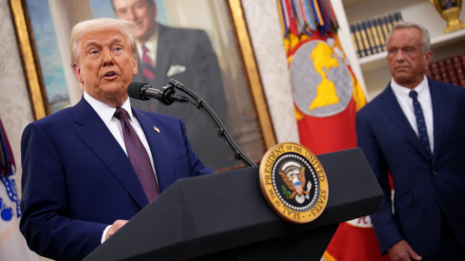 WASHINGTON, DC - FEBRUARY 13: U.S. President Donald Trump speaks alongside Robert F. Kennedy Jr. before Kennedy is sworn in as Secretary of Health and Human Services in the Oval Office at the White House on February 13, 2025 in Washington, DC. Kennedy, who faced criticism for his past comments on vaccine, was confirmed by the Senate 52 to 48. Former Senate Republican Leader Mitch McConnell (R-KY) was the only Republican to vote against him. (Photo by Andrew Harnik/Getty Images)