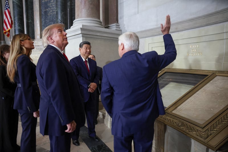 US President Donald Trump and Chinese President Xi Jinping stand beside the Bill of Rights during a tour of the National Archives led by Archivist of the United States Bradford P. Wilson, in Washington, D.C., US, September 25, 2026. REUTERS/Kevin Lamarque