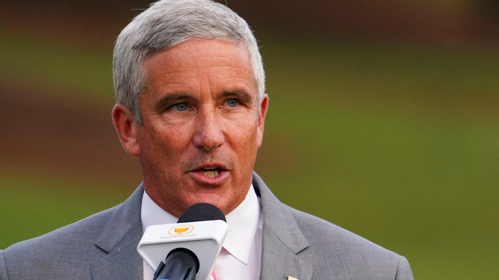 PGA Tour commissioner Jay Monahan talks during the singles match play of the Presidents Cup golf tournament at Quail Hollow Club.