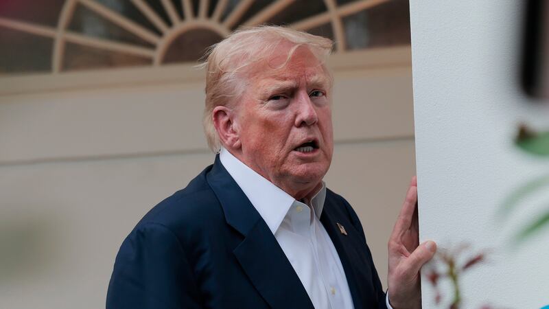 President Donald Trump speaks to reporters near the Rose Garden after returning to the White House on Marine One on July 29, 2025 in Washington, DC.