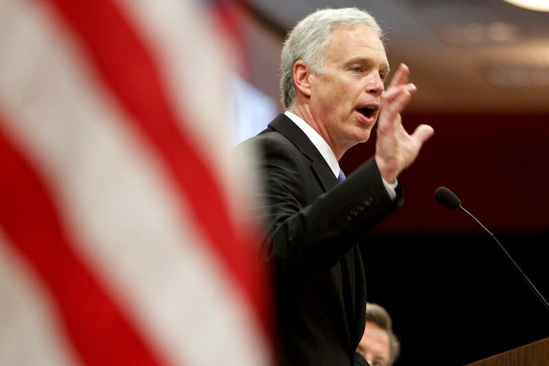 galleries/2012/08/14/paul-ryan-mark-sanford-ron-paul-and-other-politicians-who-love-ayn-rand-photos/ayn-rand-ron-johnson_odi6zc