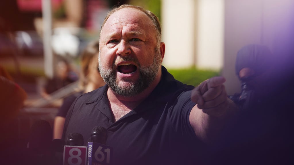 InfoWars founder Alex Jones speaks to the media outside Waterbury Superior Court during his trial on September 21, 2022 in Waterbury, Connecticut