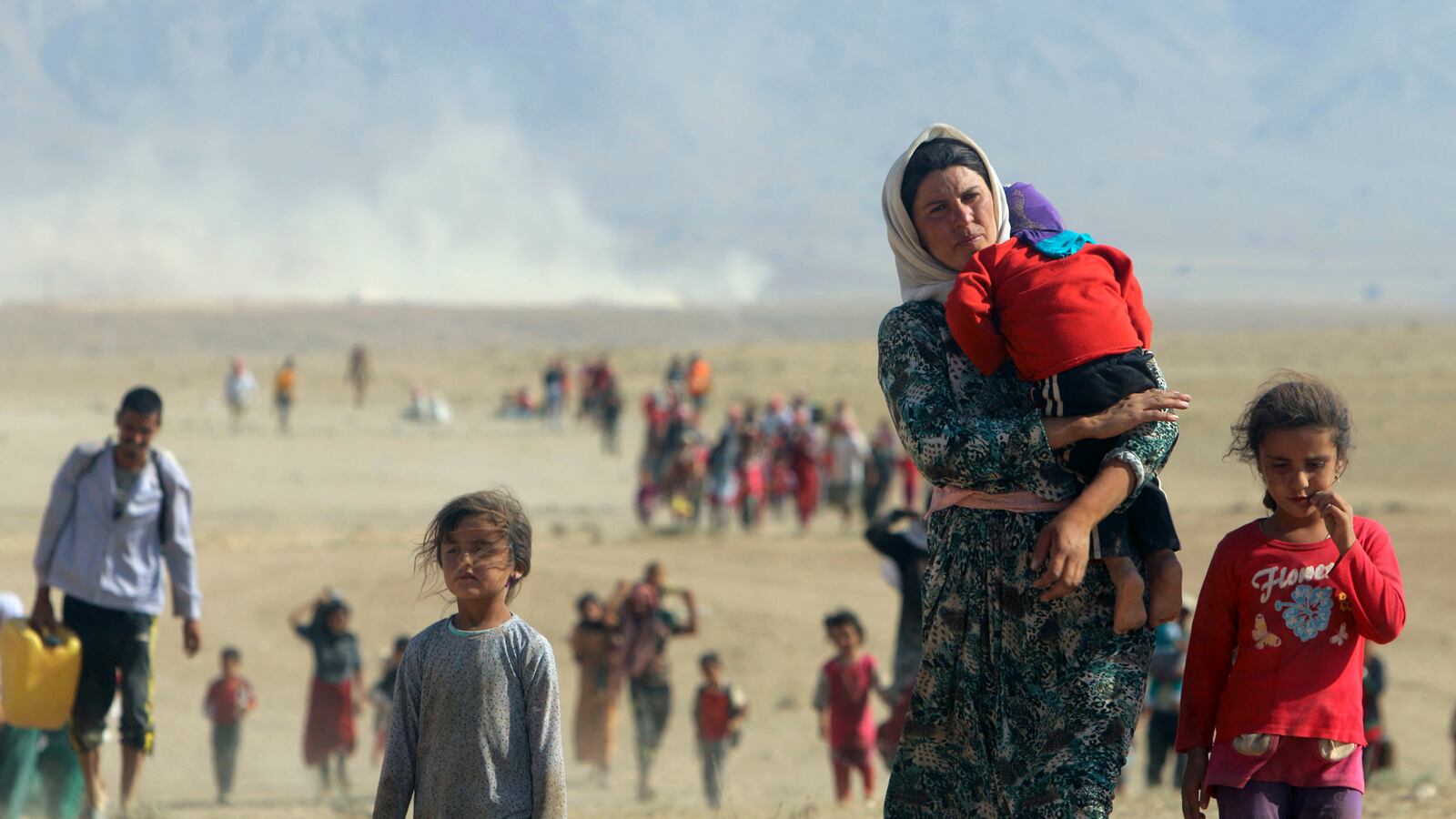 galleries/2014/08/16/yazidis-escaping-the-wrath-of-isis-photos/140815-displaced-yazidis-9_rlt4ya