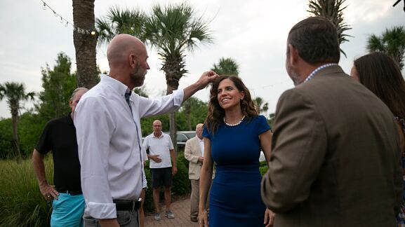 Patrick Bryant adjusts the hair of his fiancé, Rep. Nancy Mace (R-SC).