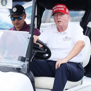 Donald Trump and Walt Nauta at Bedminster.