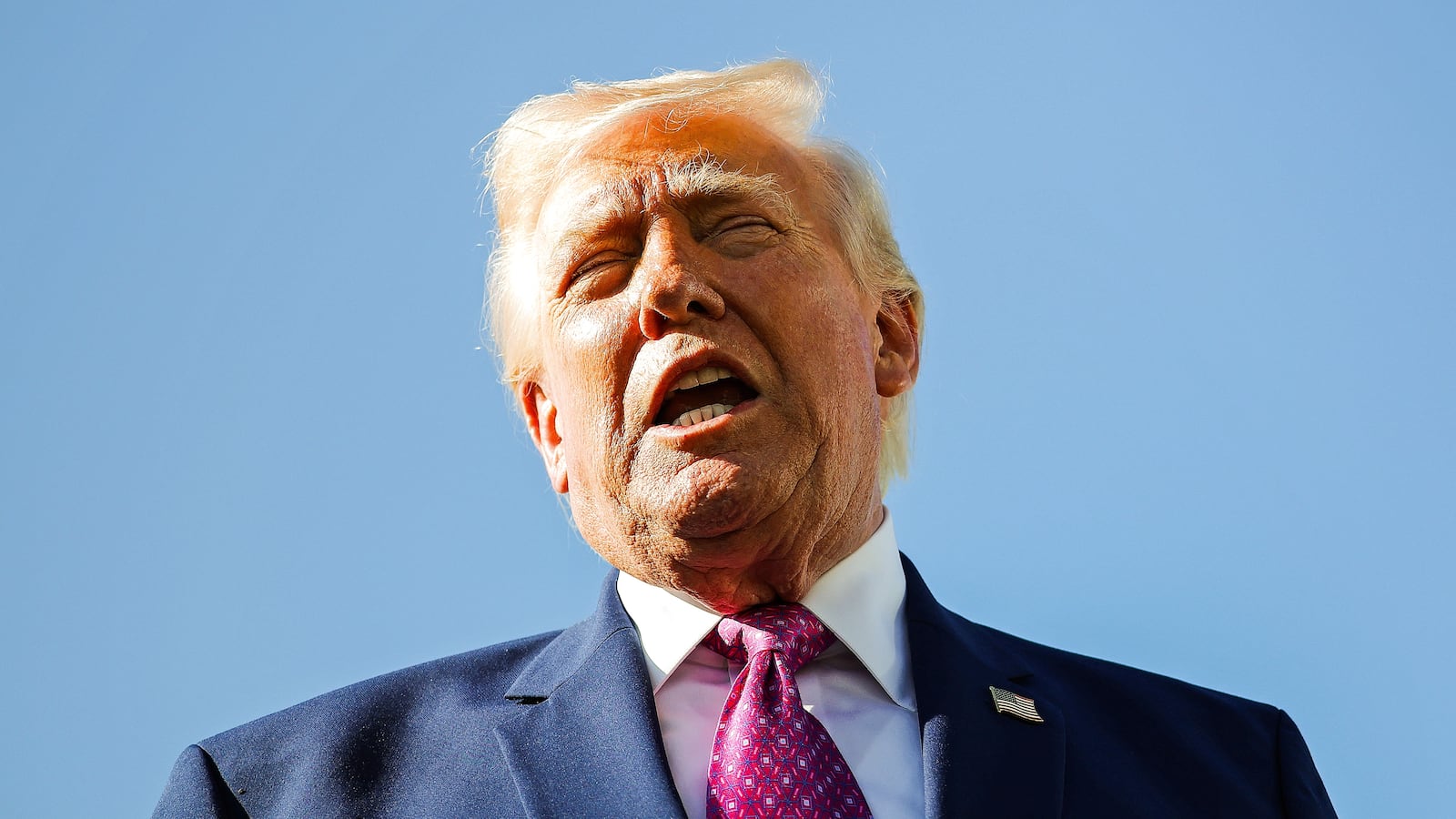 U.S. President Donald Trump speaks to reporters.