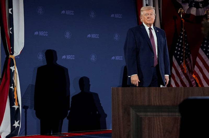 U.S. President Donald Trump looks on during the National Republican Congressional Committee (NRCC) annual fundraising dinner in Washington, D.C., U.S., March 25, 2026.