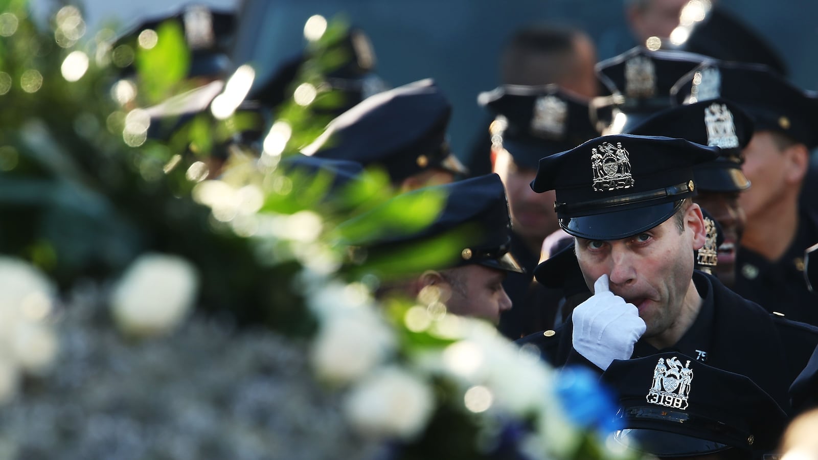 cheats/2014/12/27/thousands-attend-slain-nypd-cop-s-burial/141227-ramos-funeral-cheat_xxfzkj