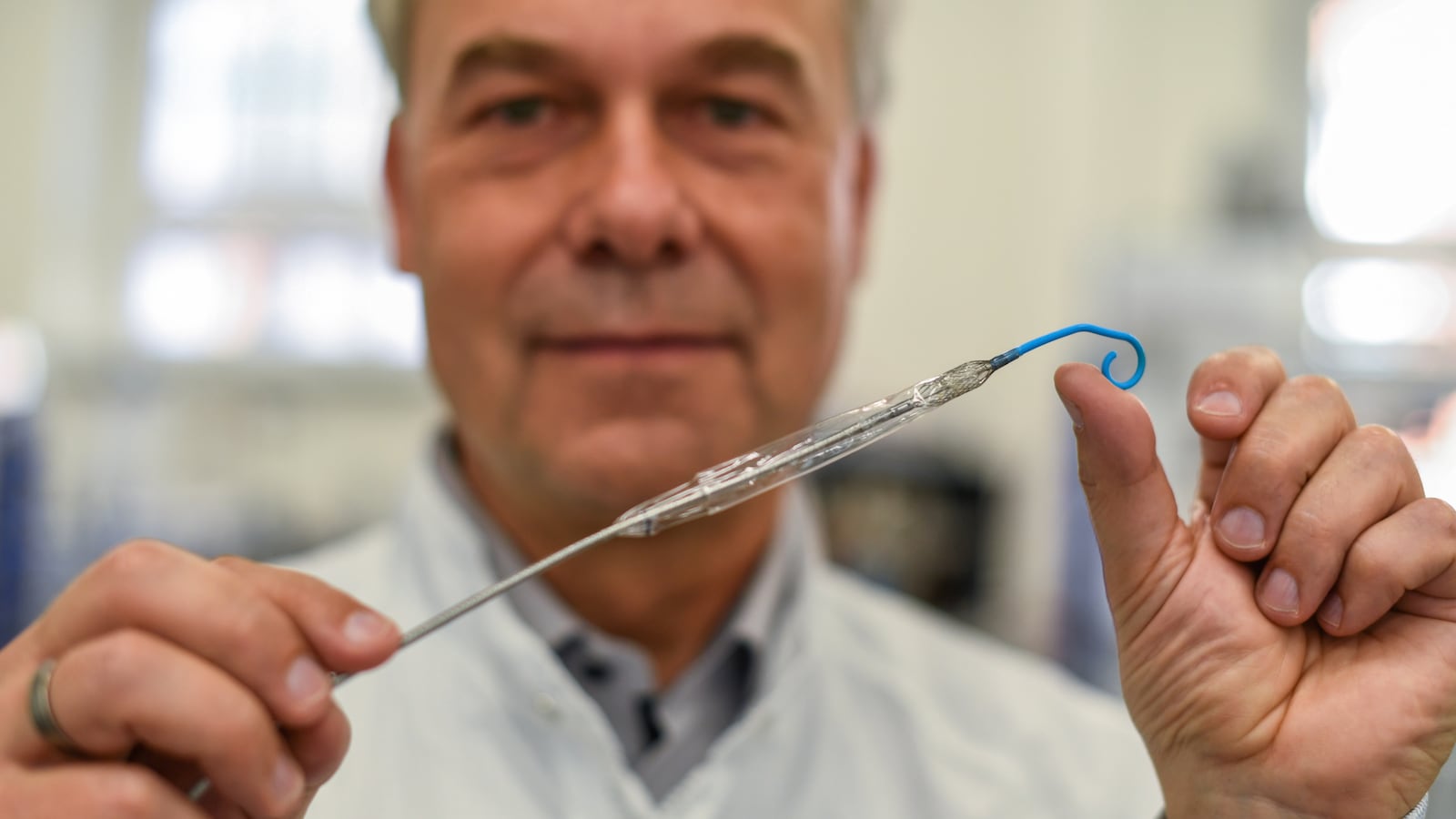 Abiomed’s Dr. Thorsten Siess shows the Impella heart pump.