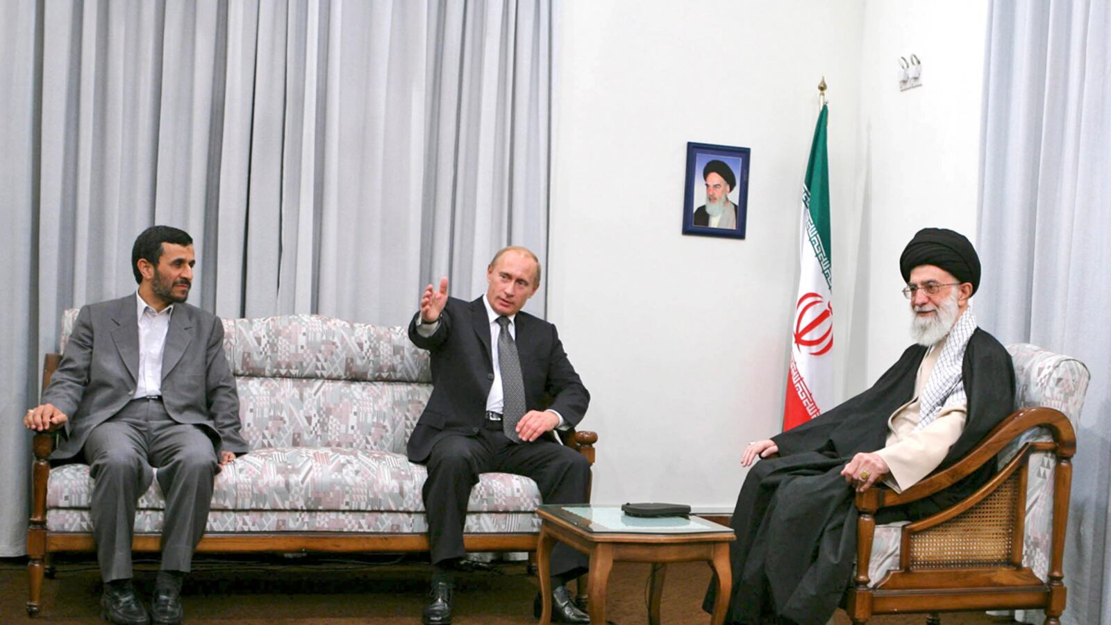 articles/2011/09/26/ayatollah-khamenei-and-vladimir-putin/putin-khamenei-milani-teaser_y7f0fq