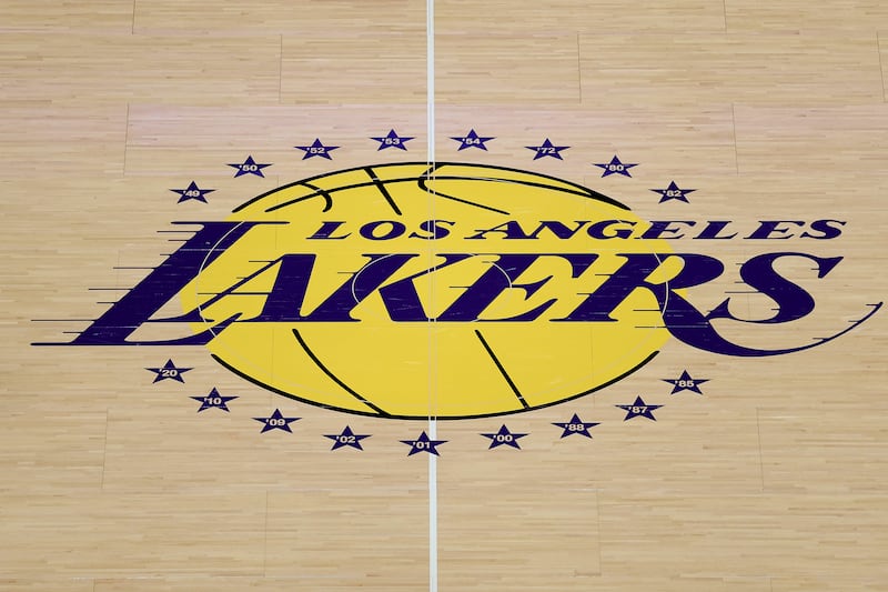A detailed view of the Los Angeles Lakers logo at midcourt before the game against the Golden State Warriors at Crypto.com Arena on October 21, 2025 in Los Angeles, California.