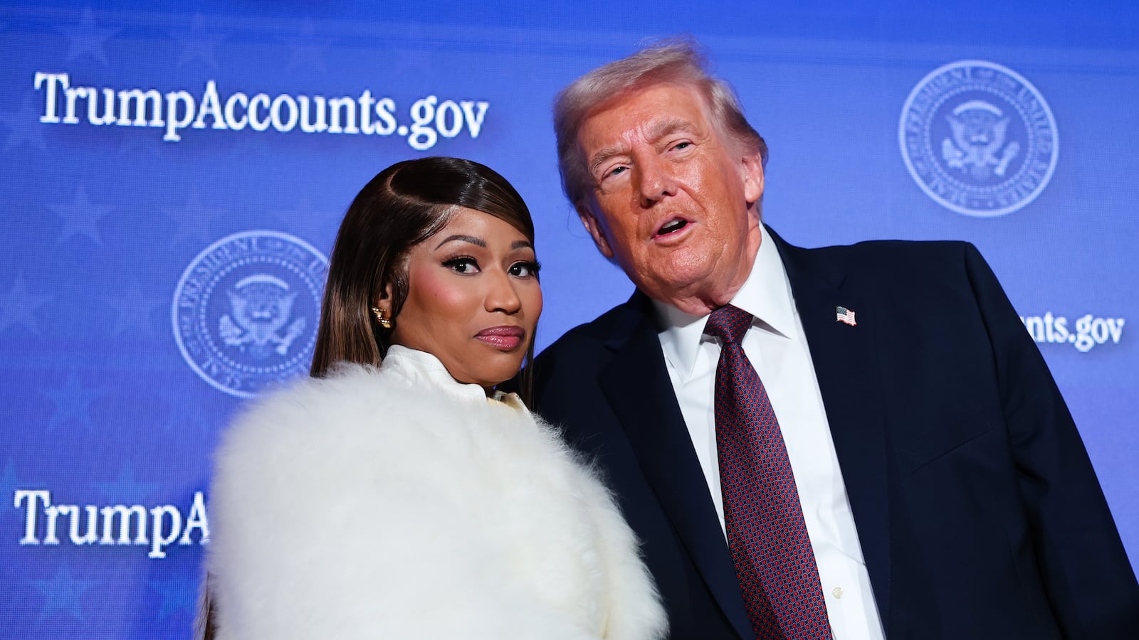 Rapper Nicki Minaj joined President Donald Trump on stage as he deliversed remarks during the Treasury Department's Trump Accounts Summit at Andrew W. Mellon Auditorium on January 28, 2026 in Washington, DC.