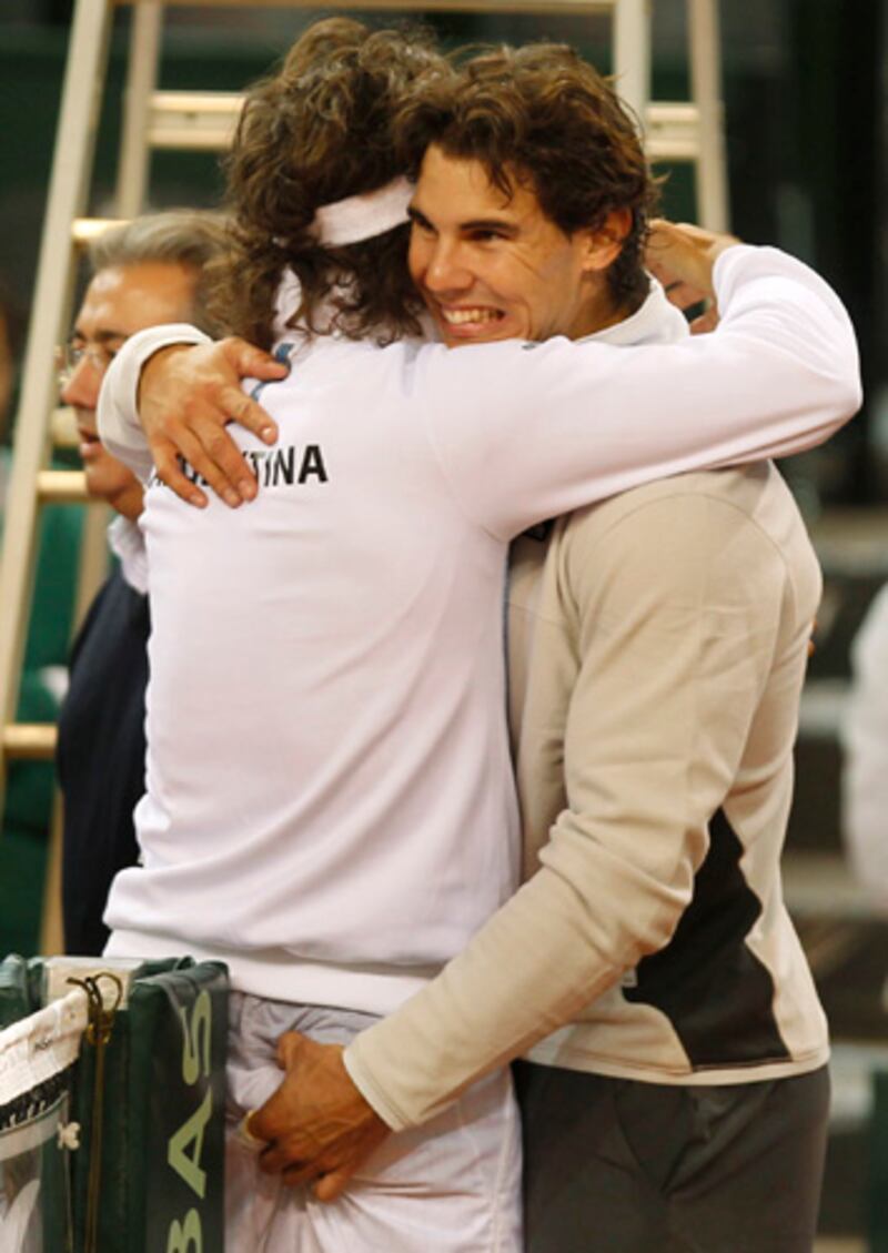 galleries/2012/02/22/celebrity-booty-grabbers-pitt-bieber-jolie-caught-in-the-act-photos/rafael-nadal-juan-monaco-celebrity-butt-grabbers_axkigl