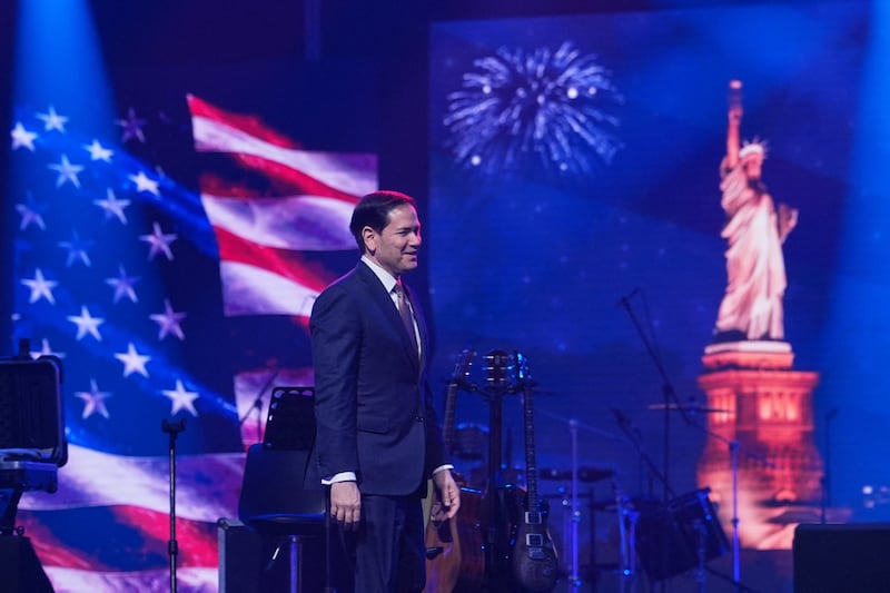 U.S. Secretary of State Marco Rubio arrives on stage to speak at an event celebrating the United States' 250th anniversary, at the Bharat Mandapam convention center, in New Delhi, India, Sunday, May 24, 2026.