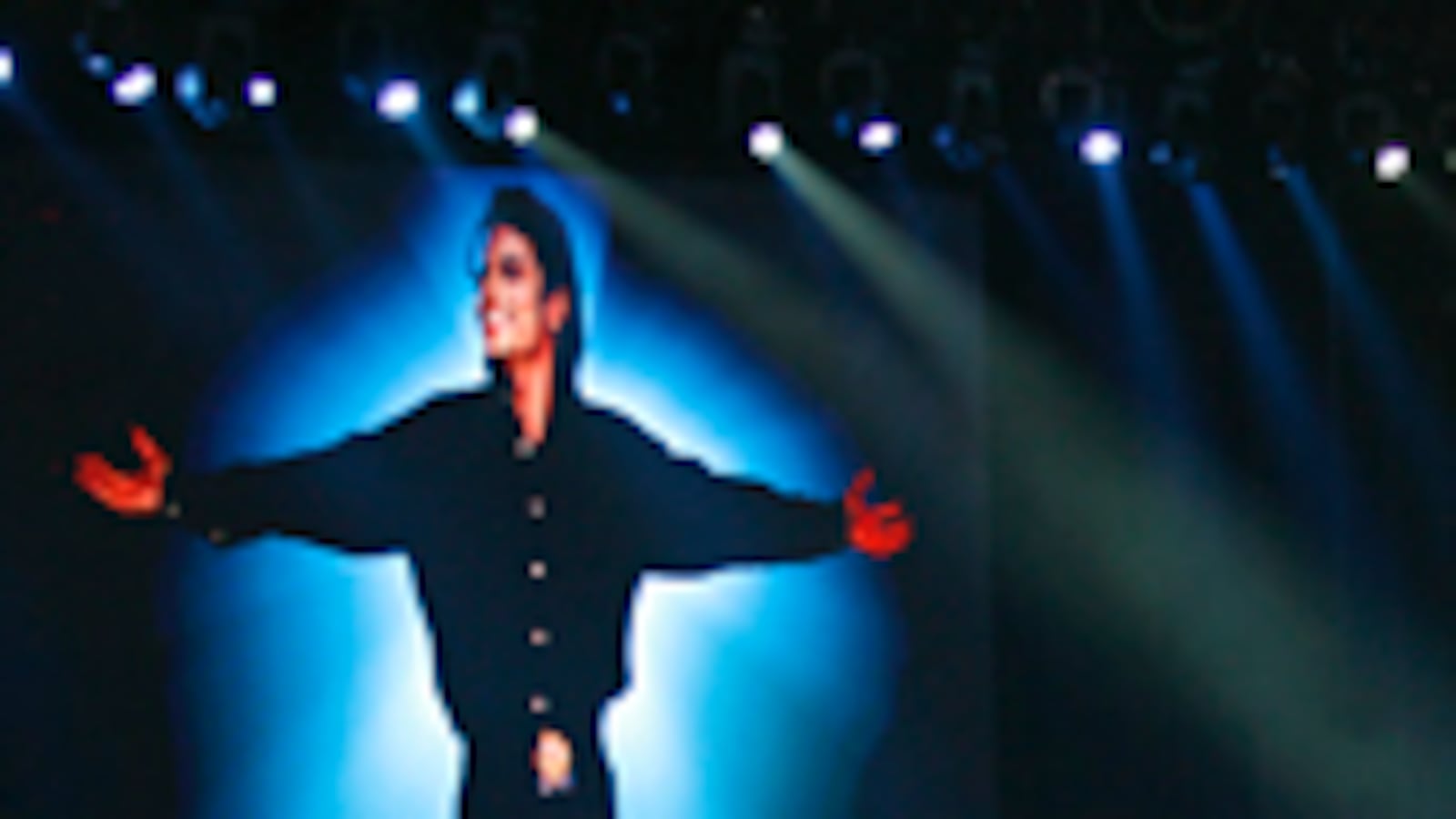 articles/2009/07/07/the-big-neverland-in-the-sky/crouch-michael-jackson-memorial_36367_edjp0p