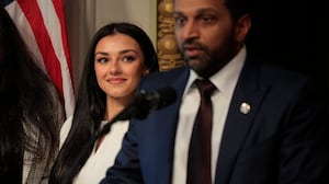 WASHINGTON, DC - FEBRUARY 21: New Federal Bureau of Investigation Director Kash Patel speaks as his girlfriend Alexis Wilkins (C) looks on during his swearing in ceremon in the Indian Treaty Room in the Eisenhower Executive Office Building on February 21, 2025 in Washington, DC. Patel was confirmed by the Senate 51-49, with Sen. Susan Collins (R-ME) and Sen. Lisa Murkowski (R-AK) the only Republicans voting to oppose him. Patel has been a hard-line critic of the FBI, the nation’s most powerful law enforcement agency. (Photo by Chip Somodevilla/Getty Images)